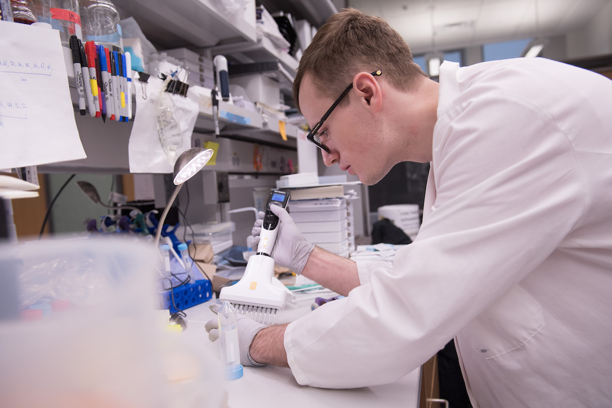 University of Iowa student Jesse Cochran works in the lab