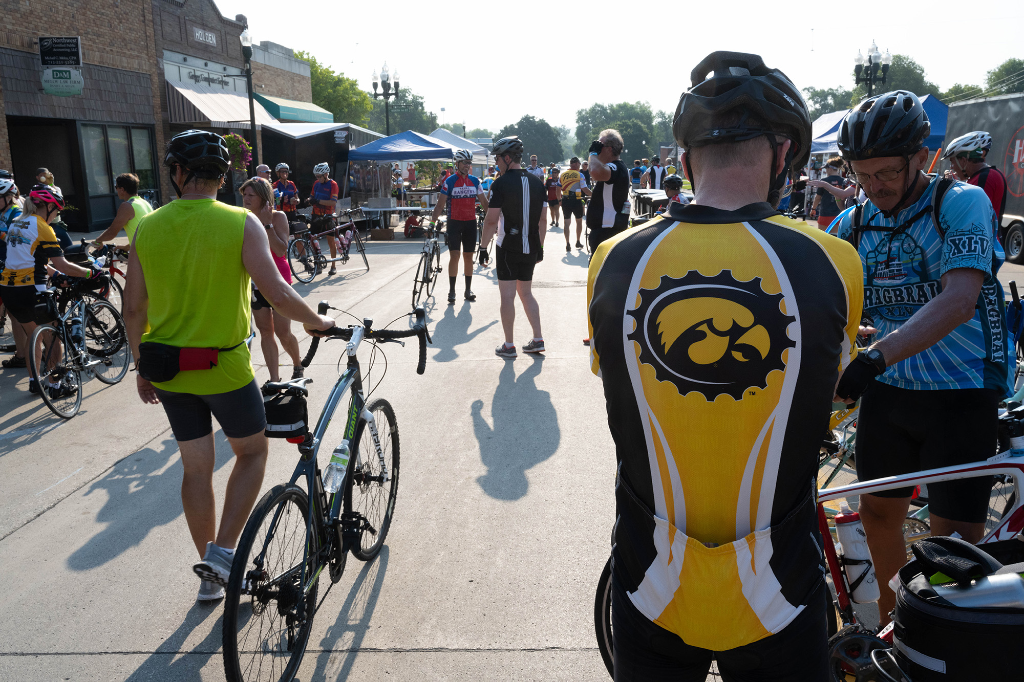 riders at ragbrai, including one sporting a tiger hawk logo