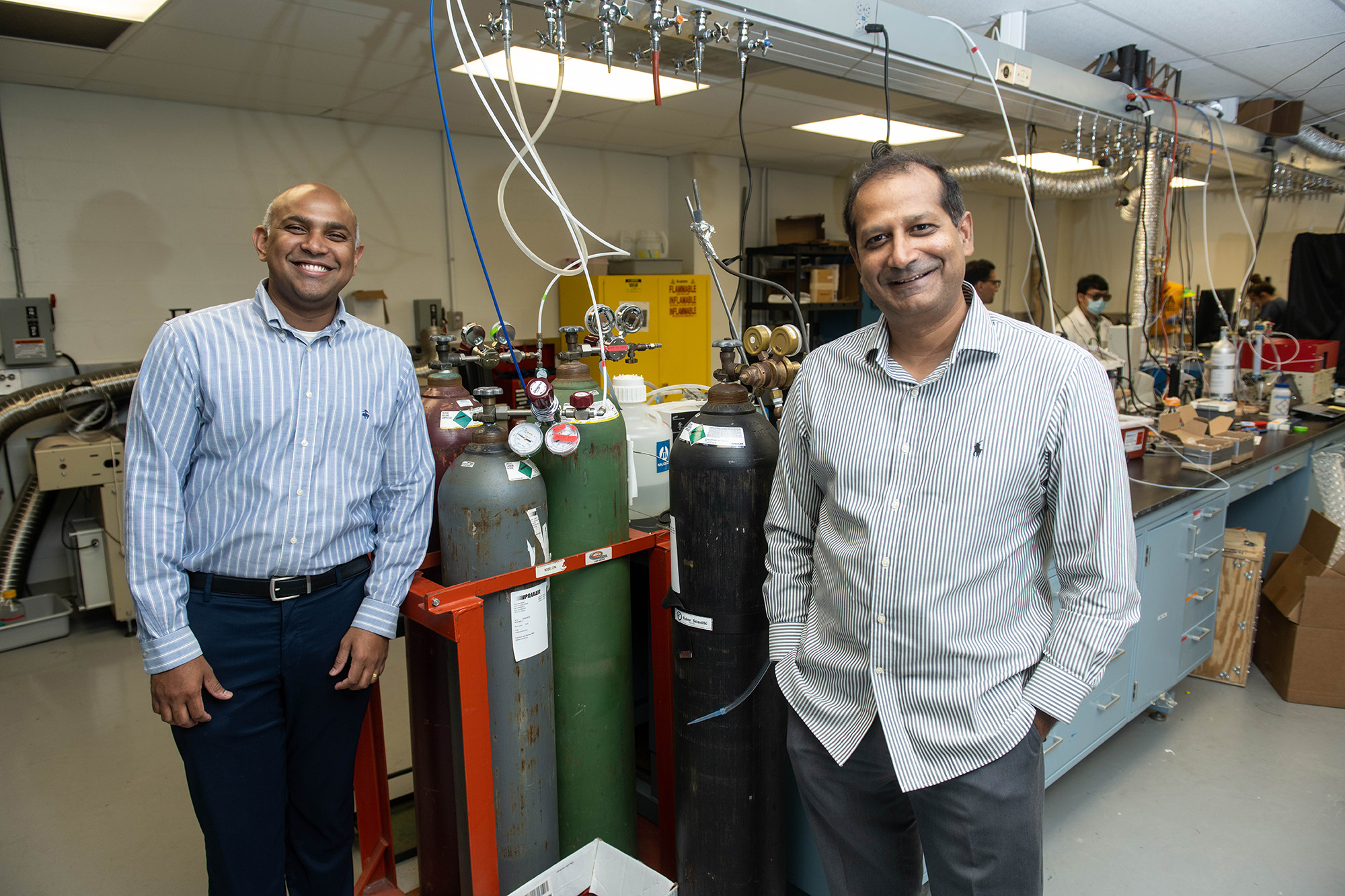 University of Iowa faculty members Syed Mubeen and Suresh Raghavan in a lab