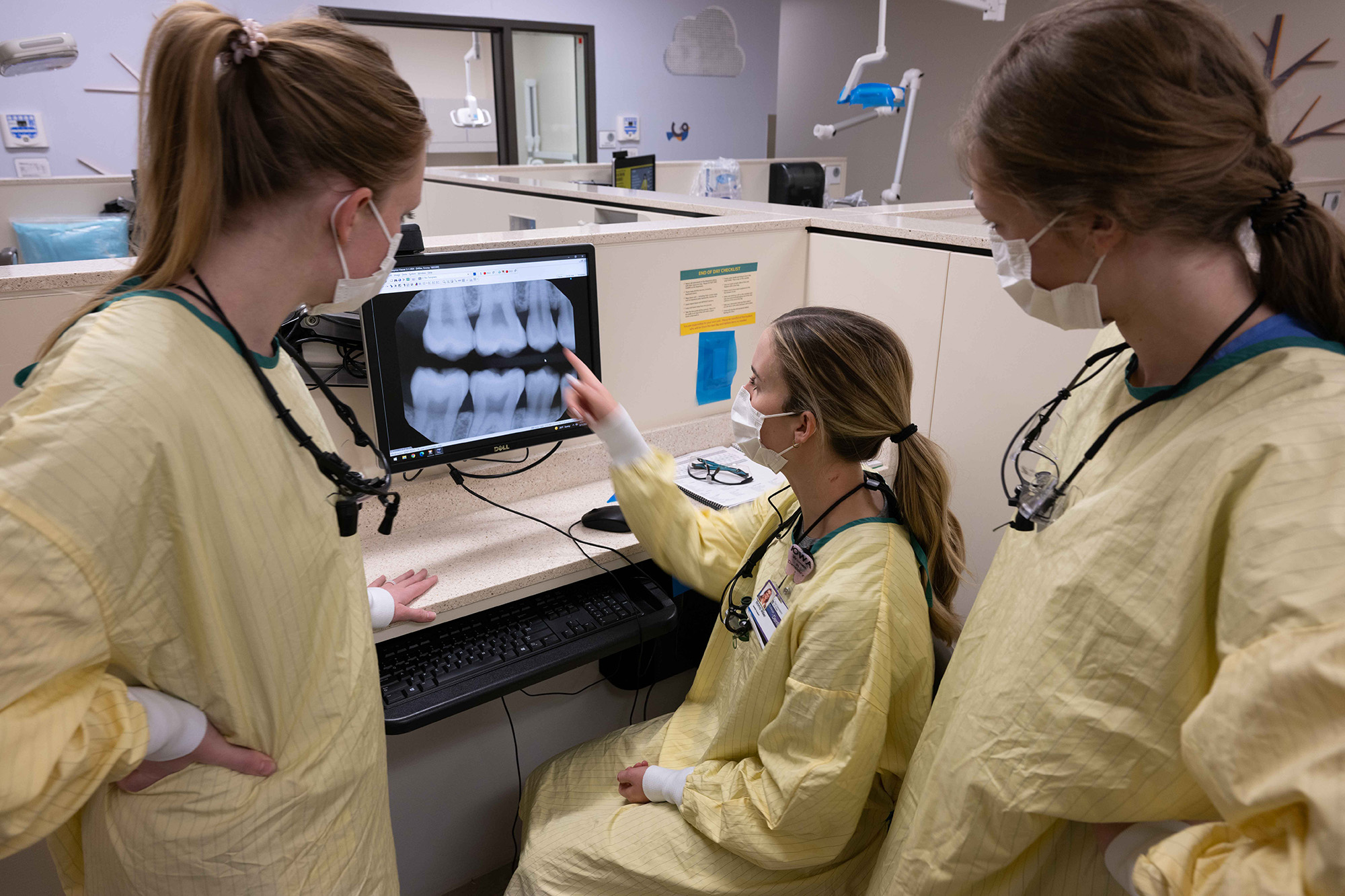 three female dentistry students