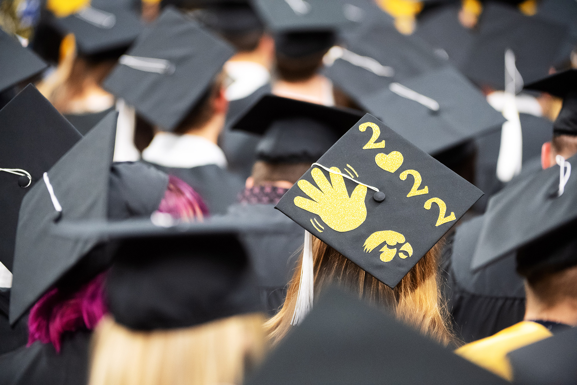 caps at a commencement ceremony