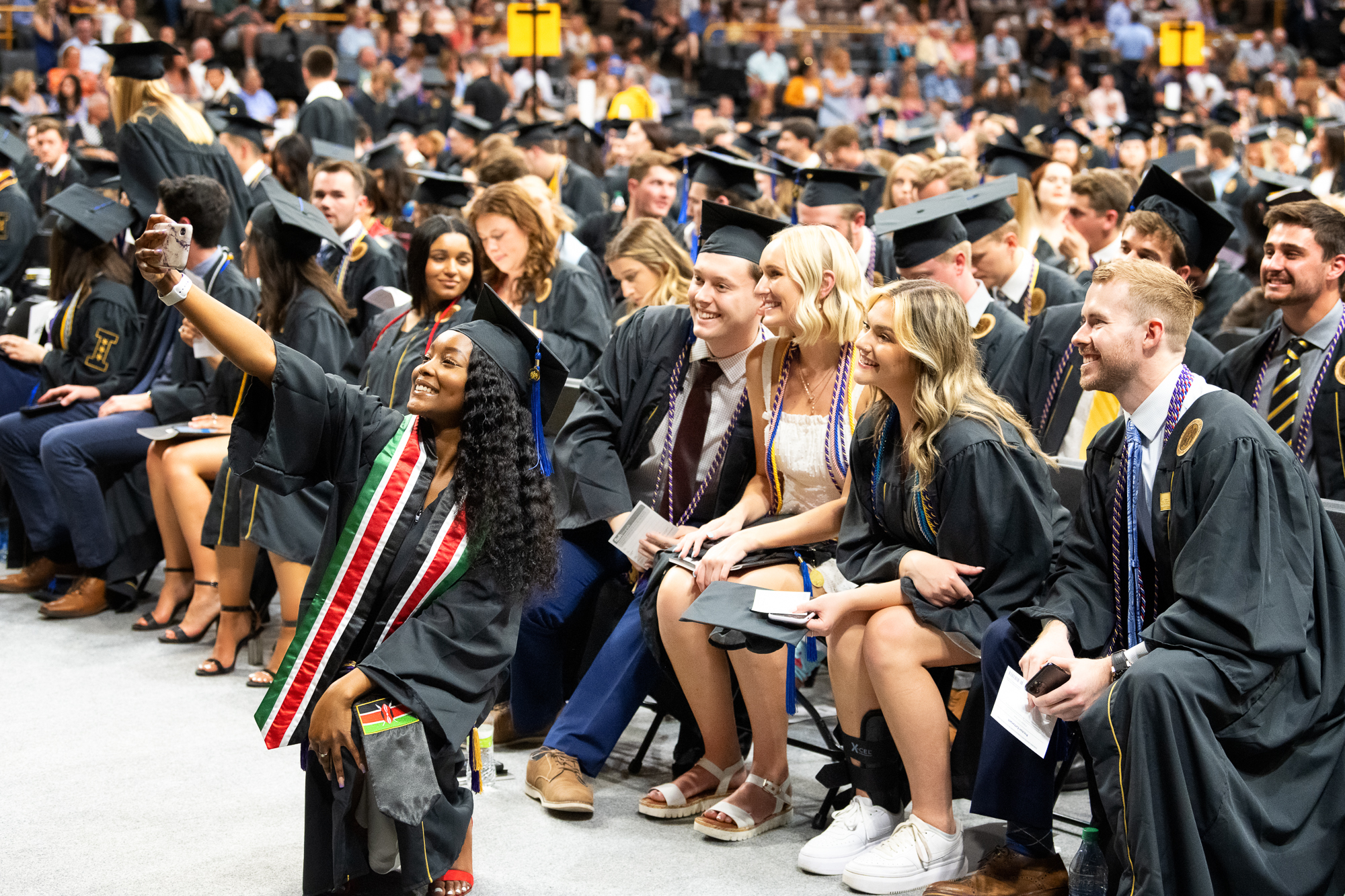 Graduates celebrate during the Tippie College of Business.
