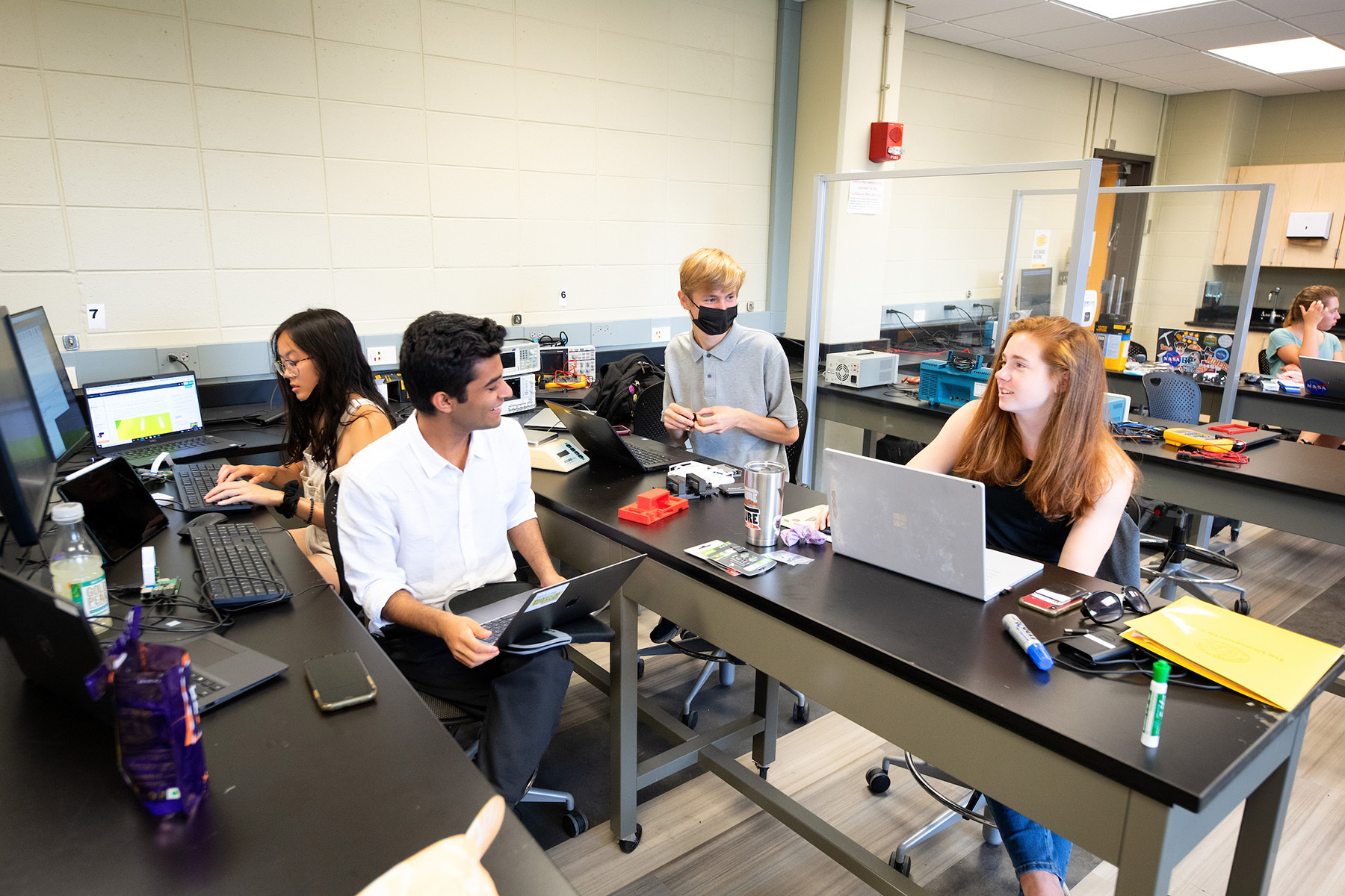 Edge of Space Academy participants work in a lab at the University of Iowa