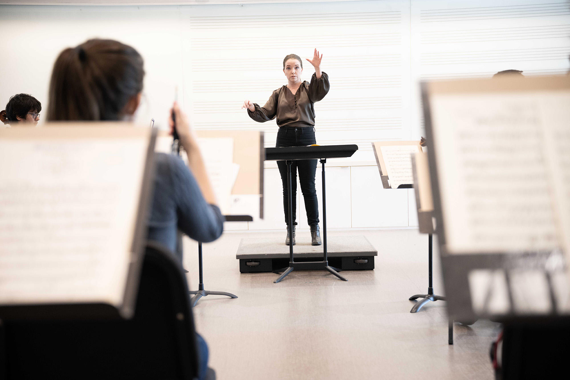 Megan Maddaleno conducting