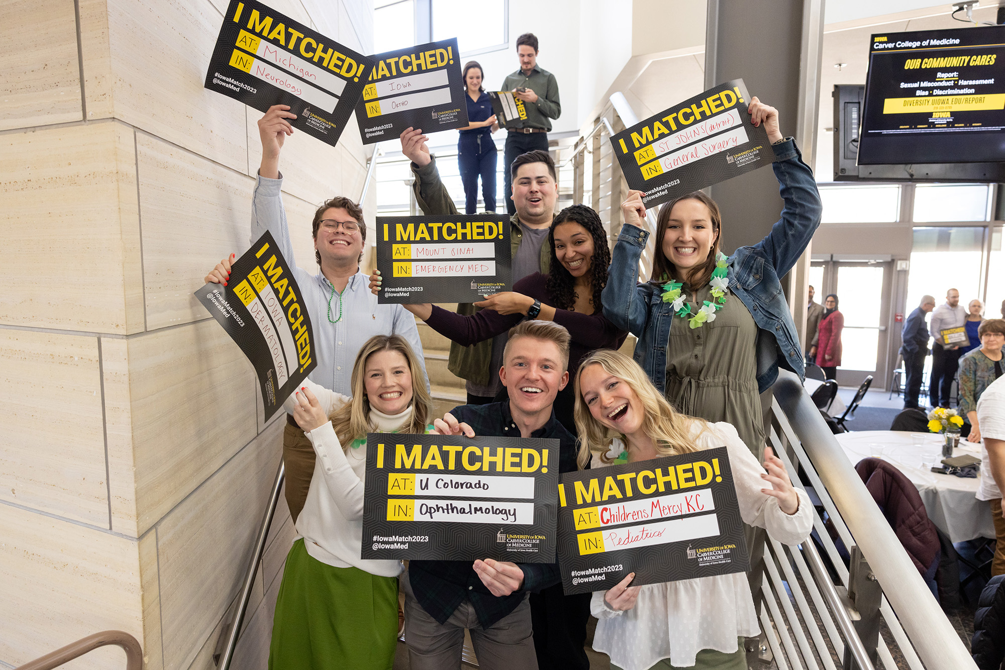 University of Iowa Carver College of Medicine students holding signs during Match Day 2023