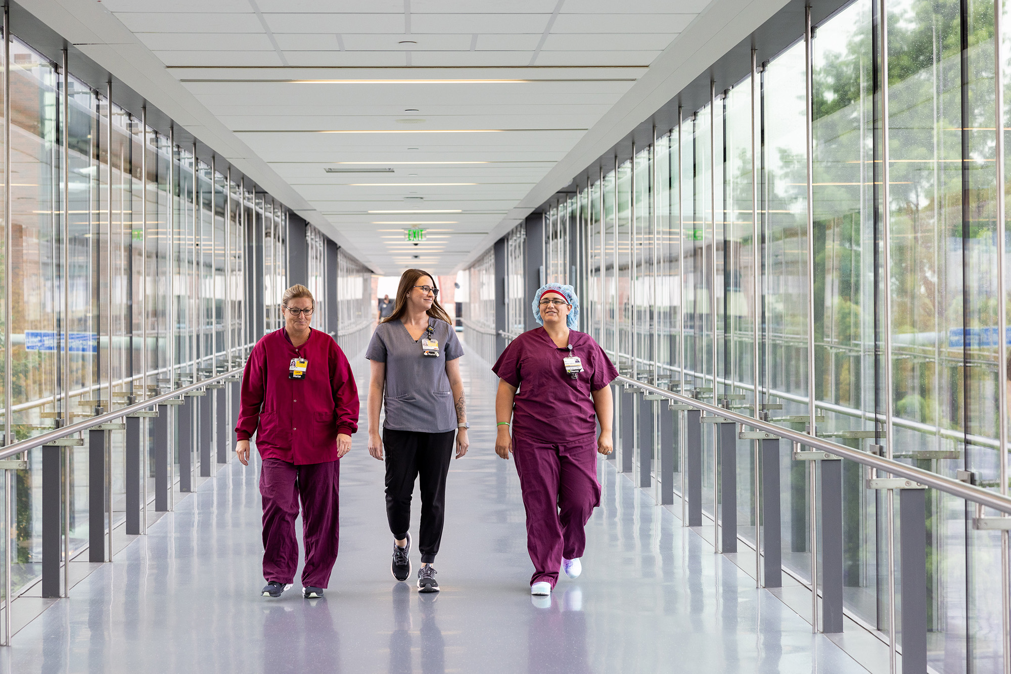 three nurses in a skywalk at university of Iowa hospitals and clinics
