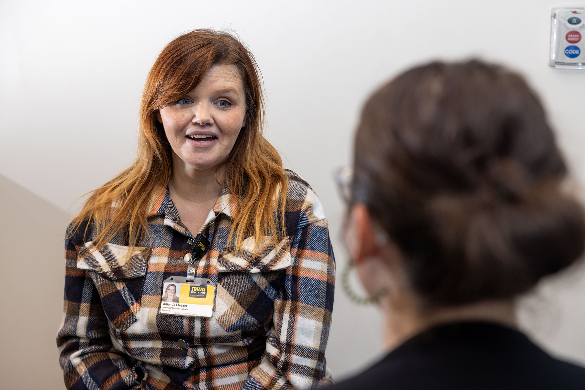 Amanda Eleazer in conversation at a clinic