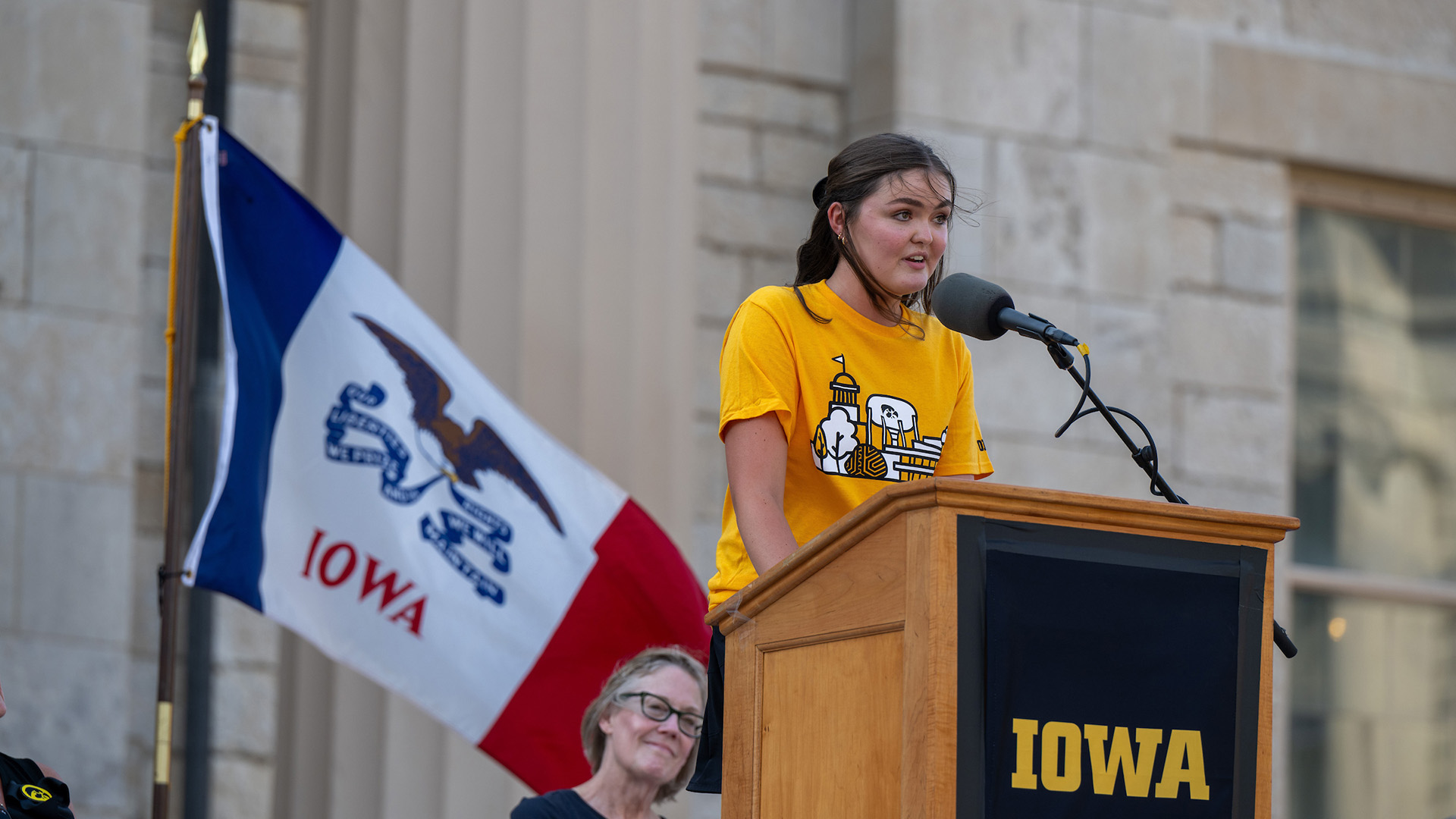 Claire Gannon delivering a speech at University of Iowa Convocation