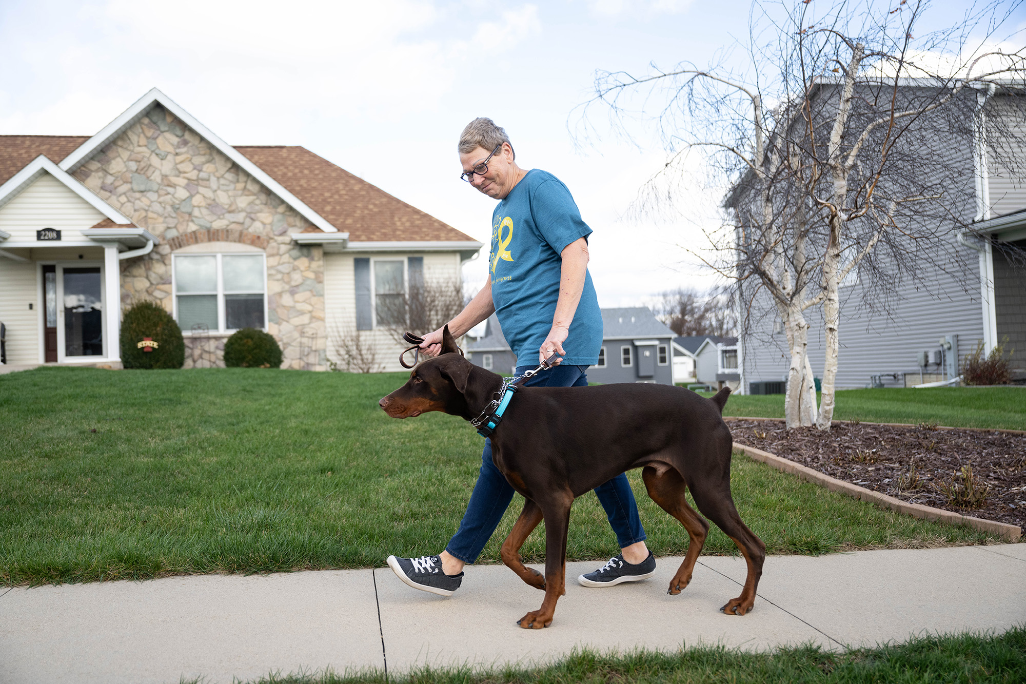 Linda Jacobs walking her dog