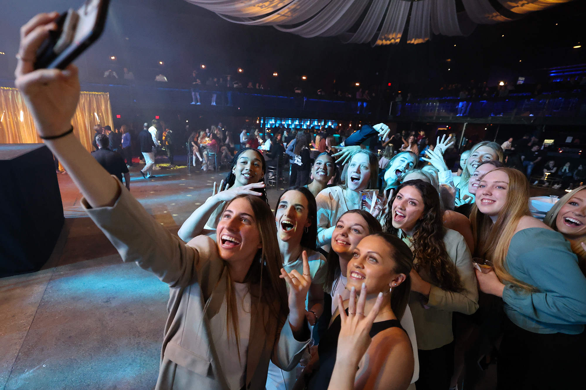 A group of basketball players posing for a selfie