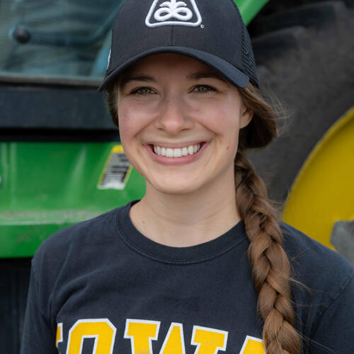 A close up of a woman smiling