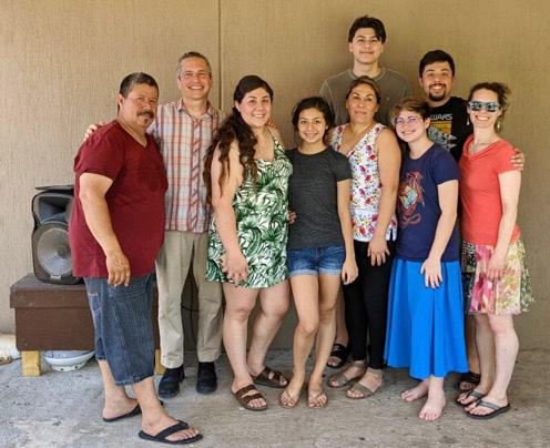 A group of people standing together for a photo