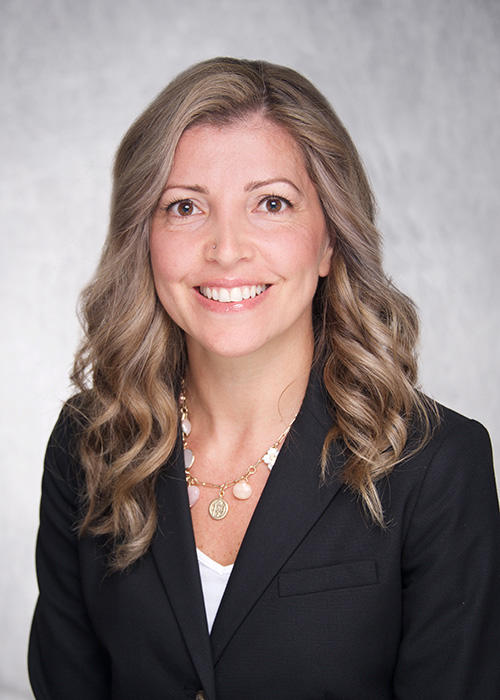 A women smiling for a portrait