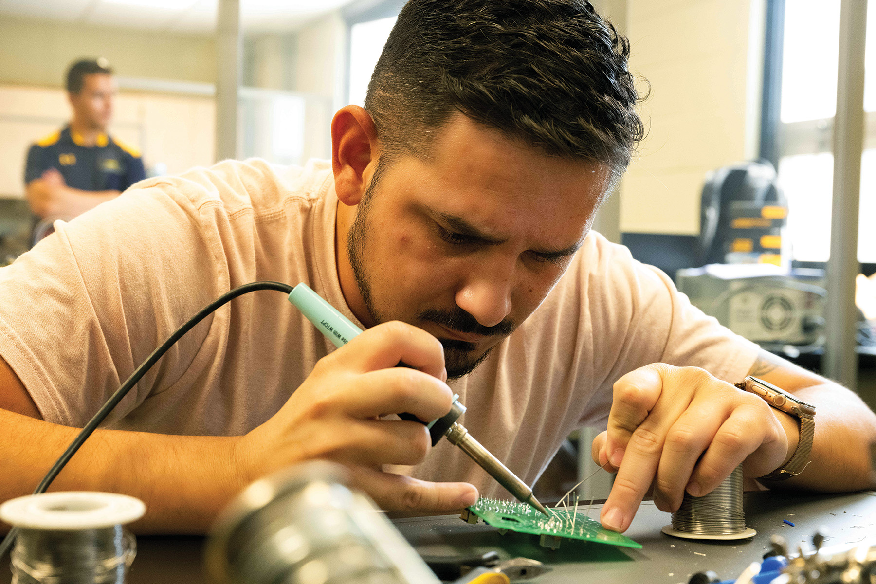 Jose Castelblanco, an engineering physics major with a spacecraft instrumentation concentration at Embry-Riddle Aeronautical University, works in Van Allen Hall during the first week of the Edge of Space Academy.