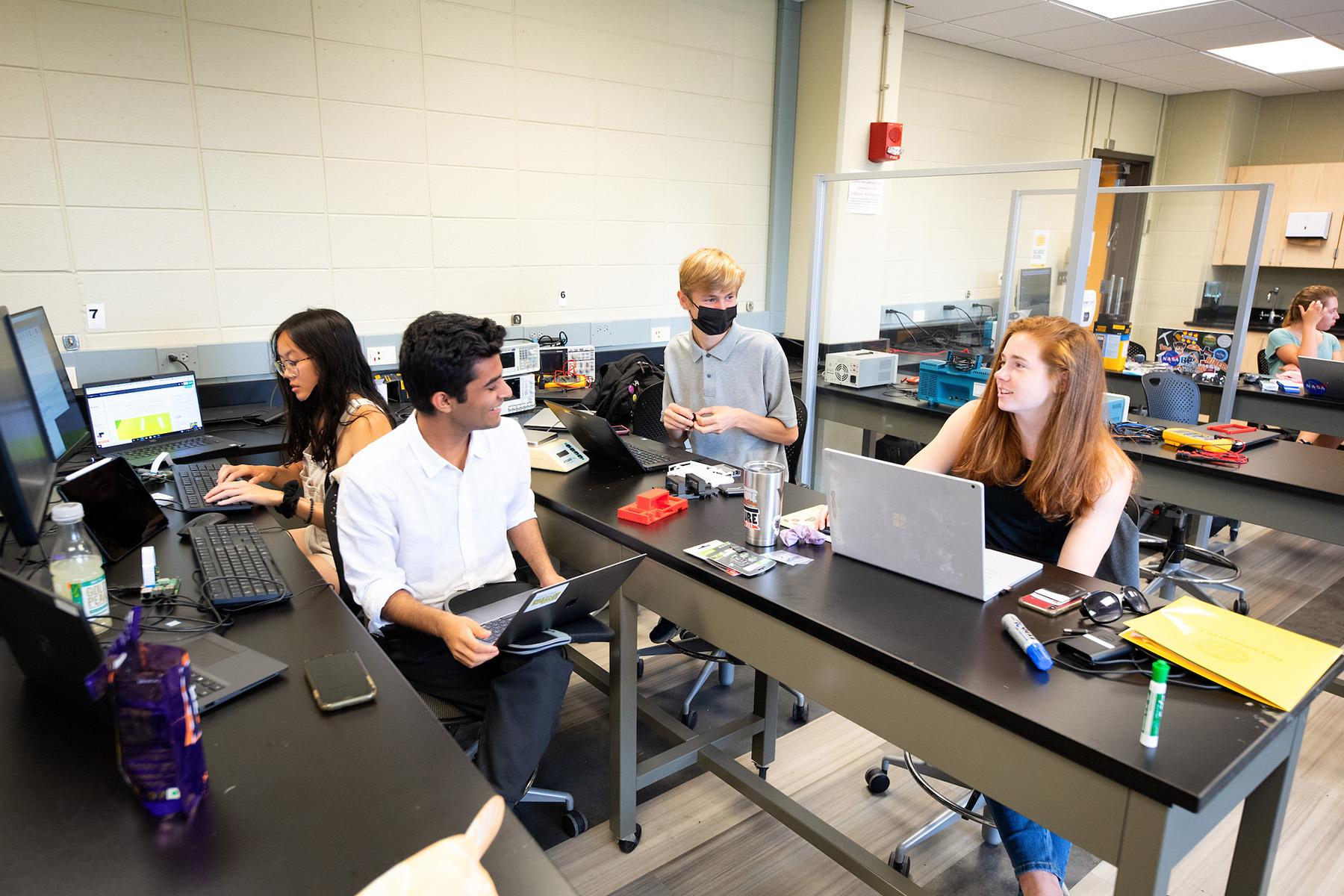 students work in Van Allen Hall during the first week of the University of Iowa’s Edge of Space Academy