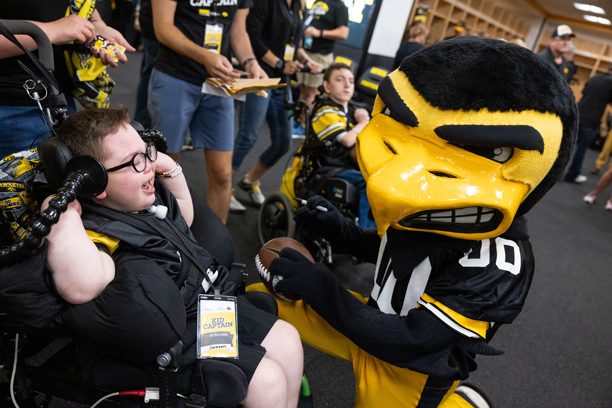 A boy talking to Herky