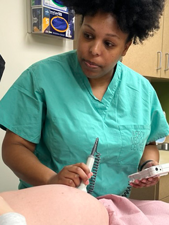 a doctor examining a pregnant patient