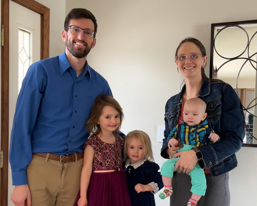 McLoughlin family portrait (parents and three young children)