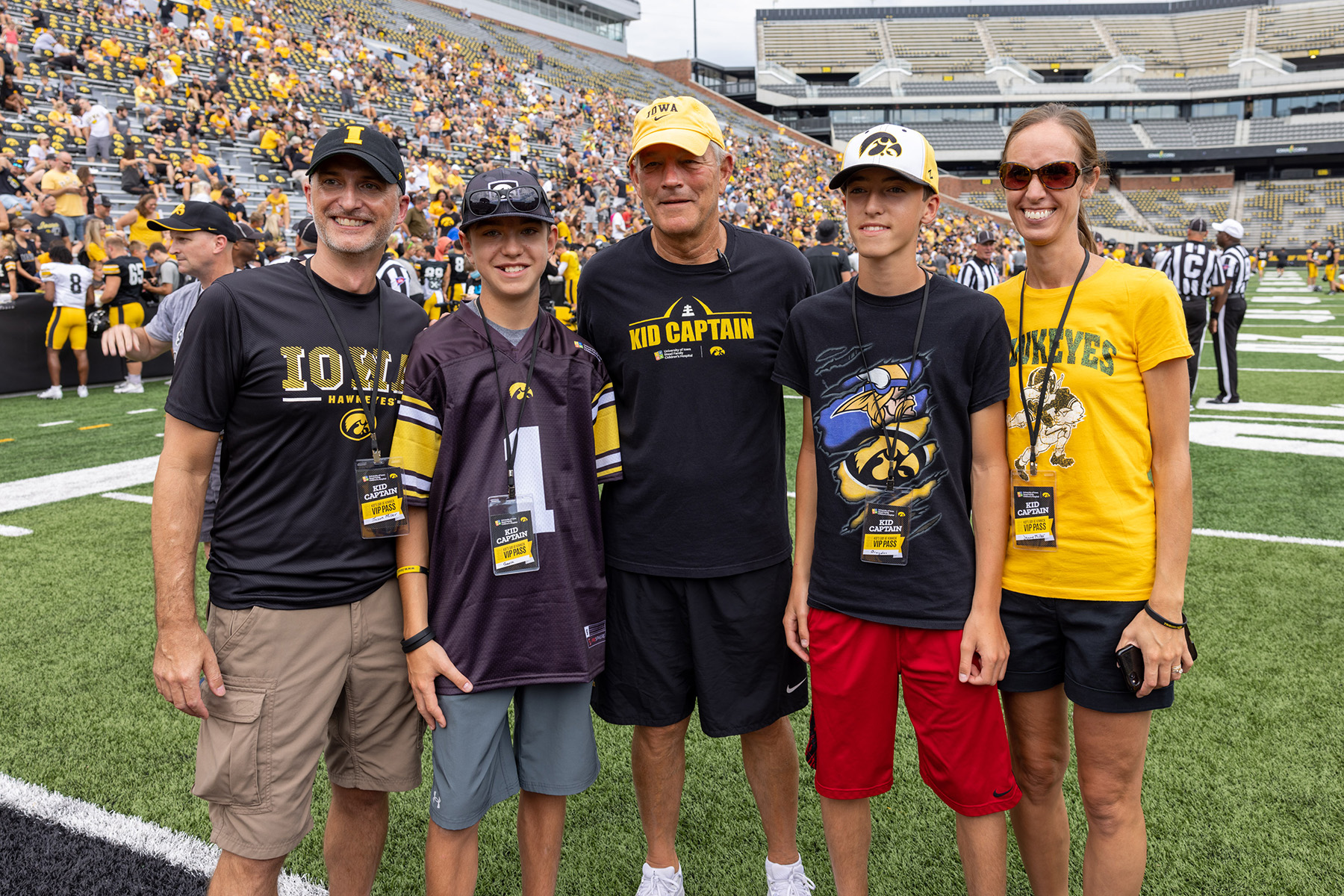 A group of people standing together on a football field