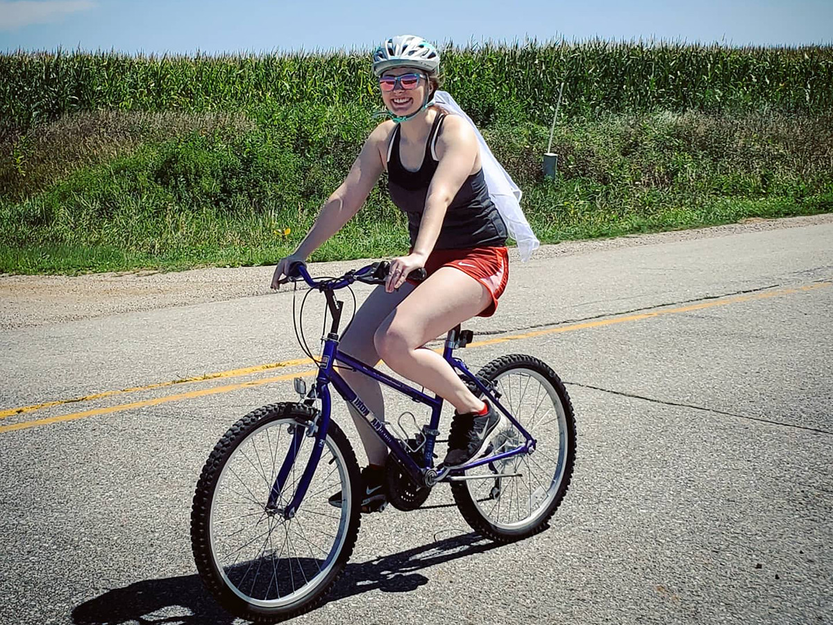 a woman riding a bicycle