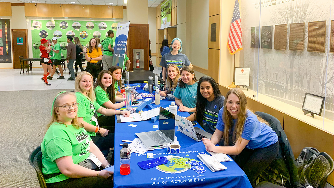 people sitting around a table at an event