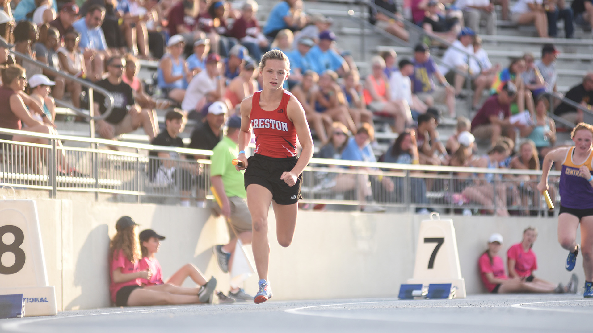 Kiersten Latham running at a track meet
