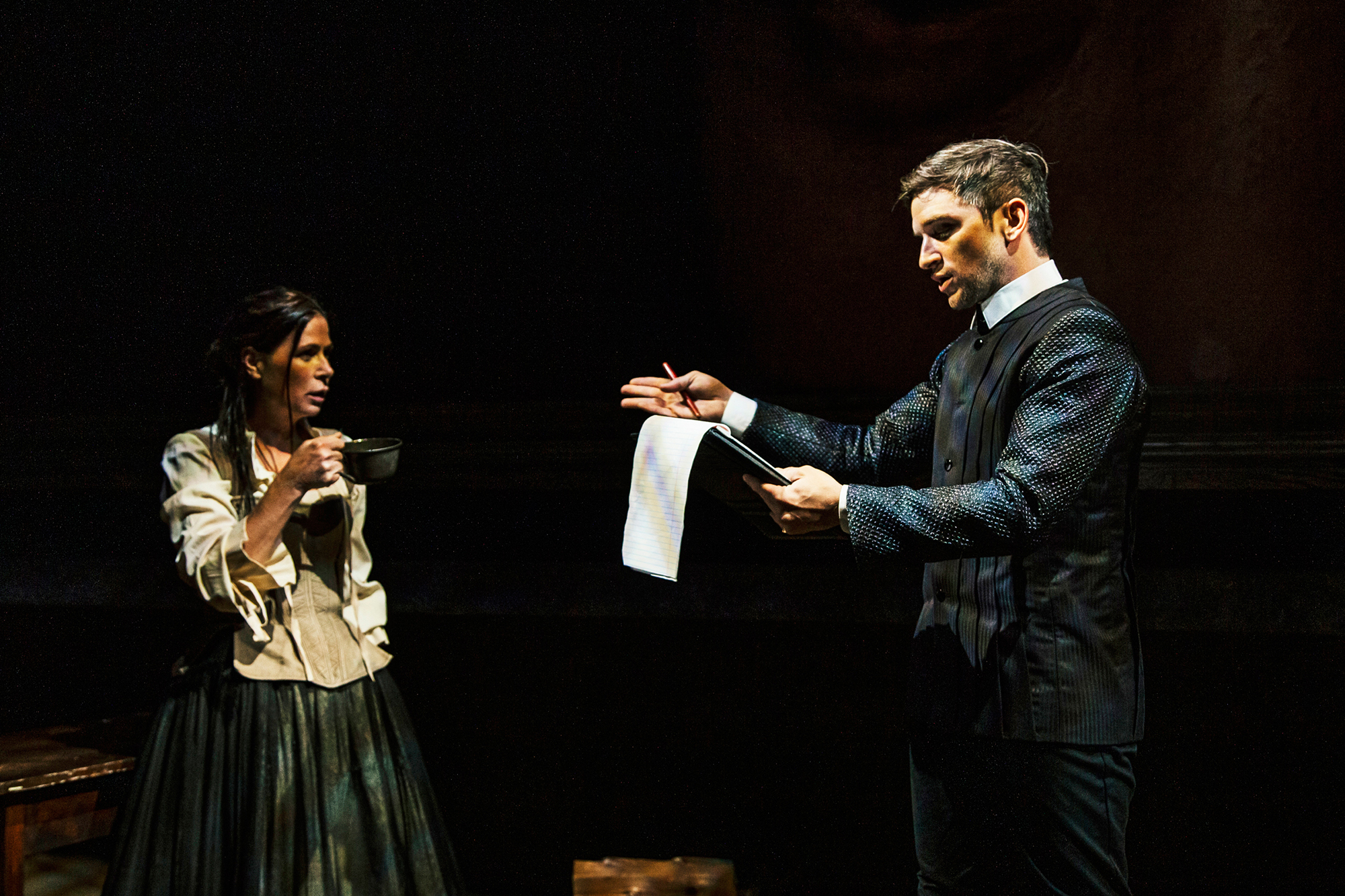 Two actors performing on stage