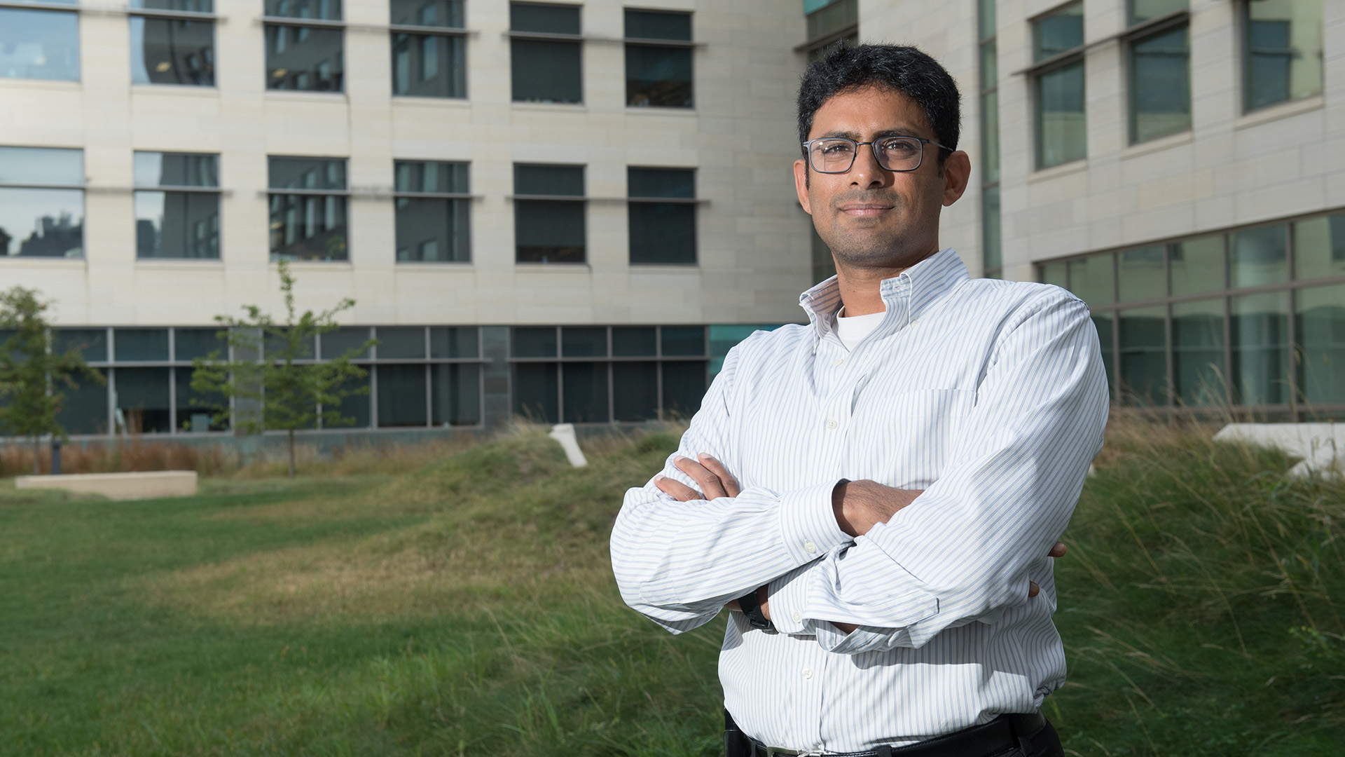 Kumar Narayanan standing outdoors on the University of Iowa campus