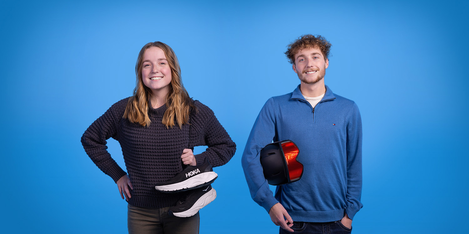 maren and berne denison; merne with a pair of running shoes, berne with a helmet