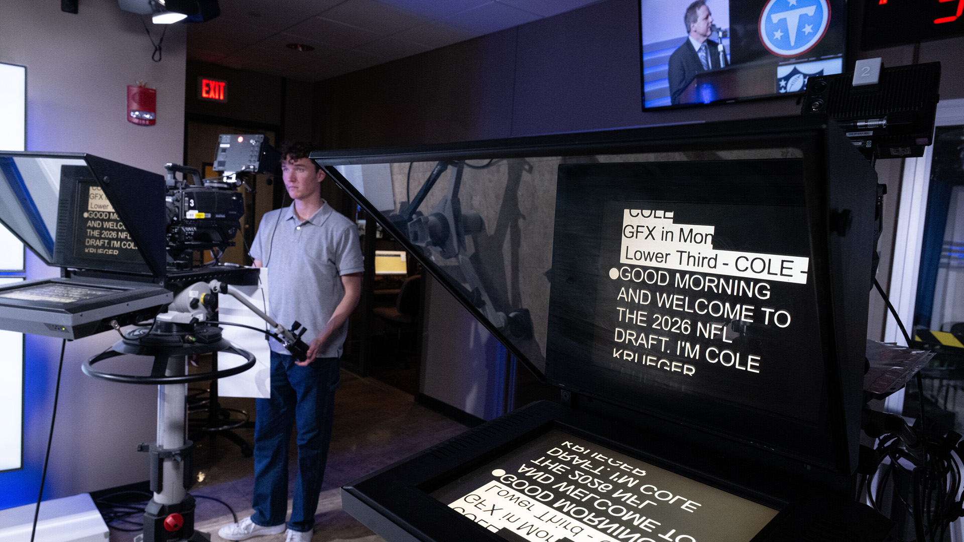 words appear on a prompter during a broadcast of a simulated National Football League draft, conduted by a class at the University of Iowa
