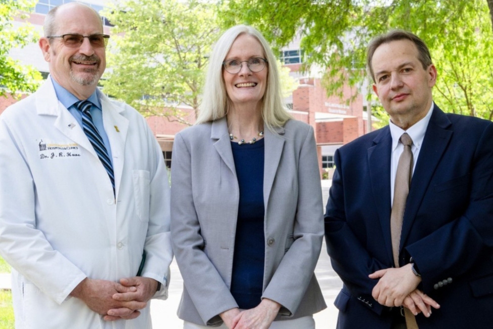 co-principal investigators James Howe, Dawn Quelle, and Yusuf Menda stand outdoors