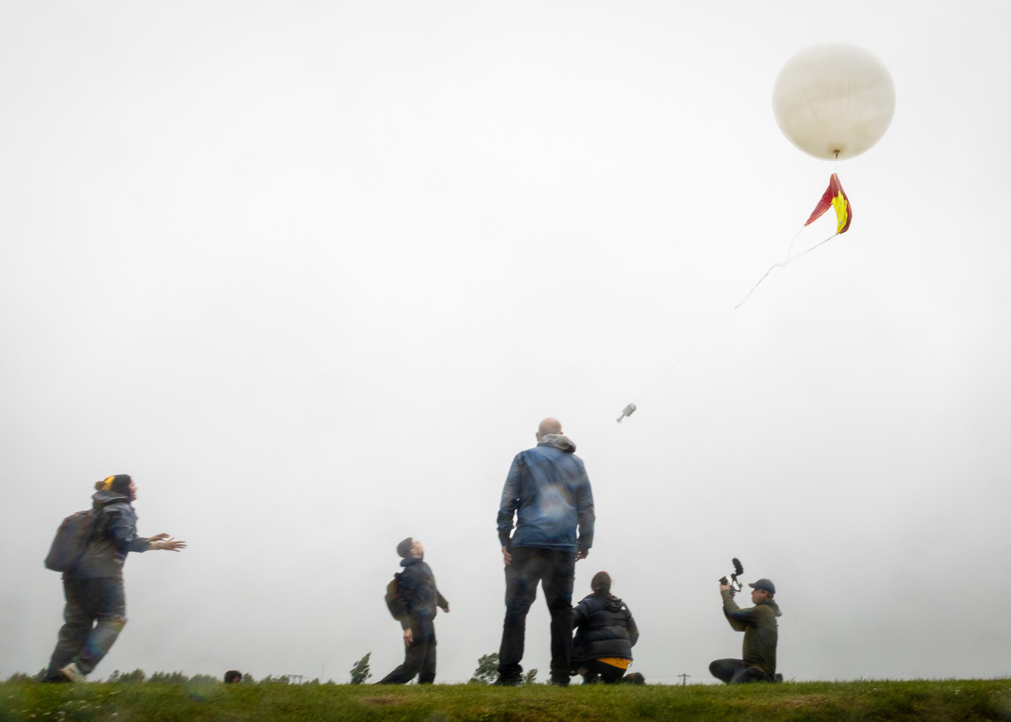 students releasing a weather balloon in Iceland
