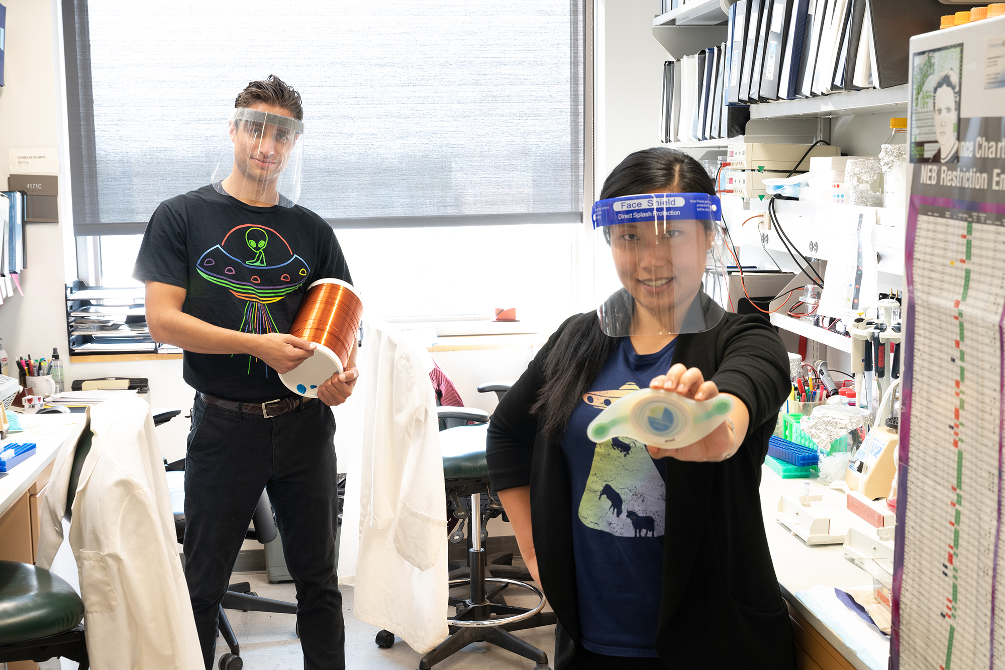 Calvin Carter, PhD, and Sunny Huang, MD/PhD student in the lab