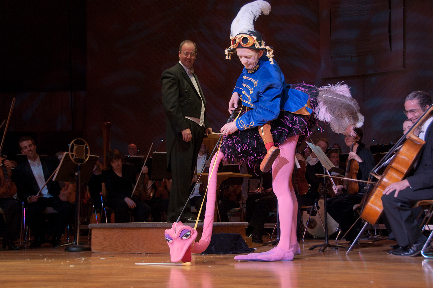 tomas kubinek on stage in costume with an orchestra