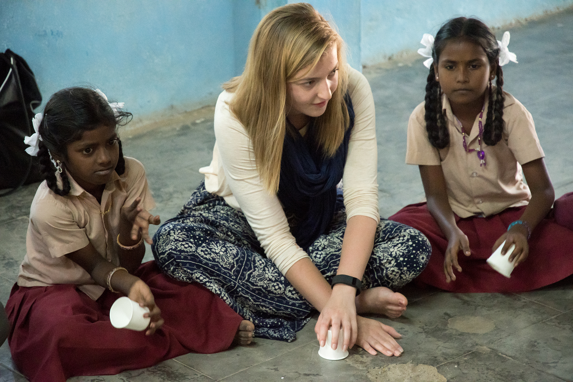 student with children in india