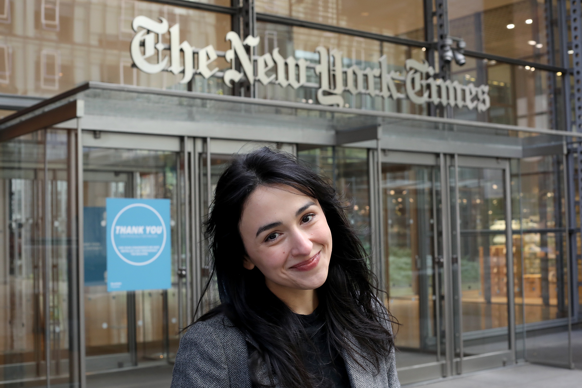 University of Iowa alumna Asmaa Elkeurti stands in front of the New York Times building, where she works as a software engineer