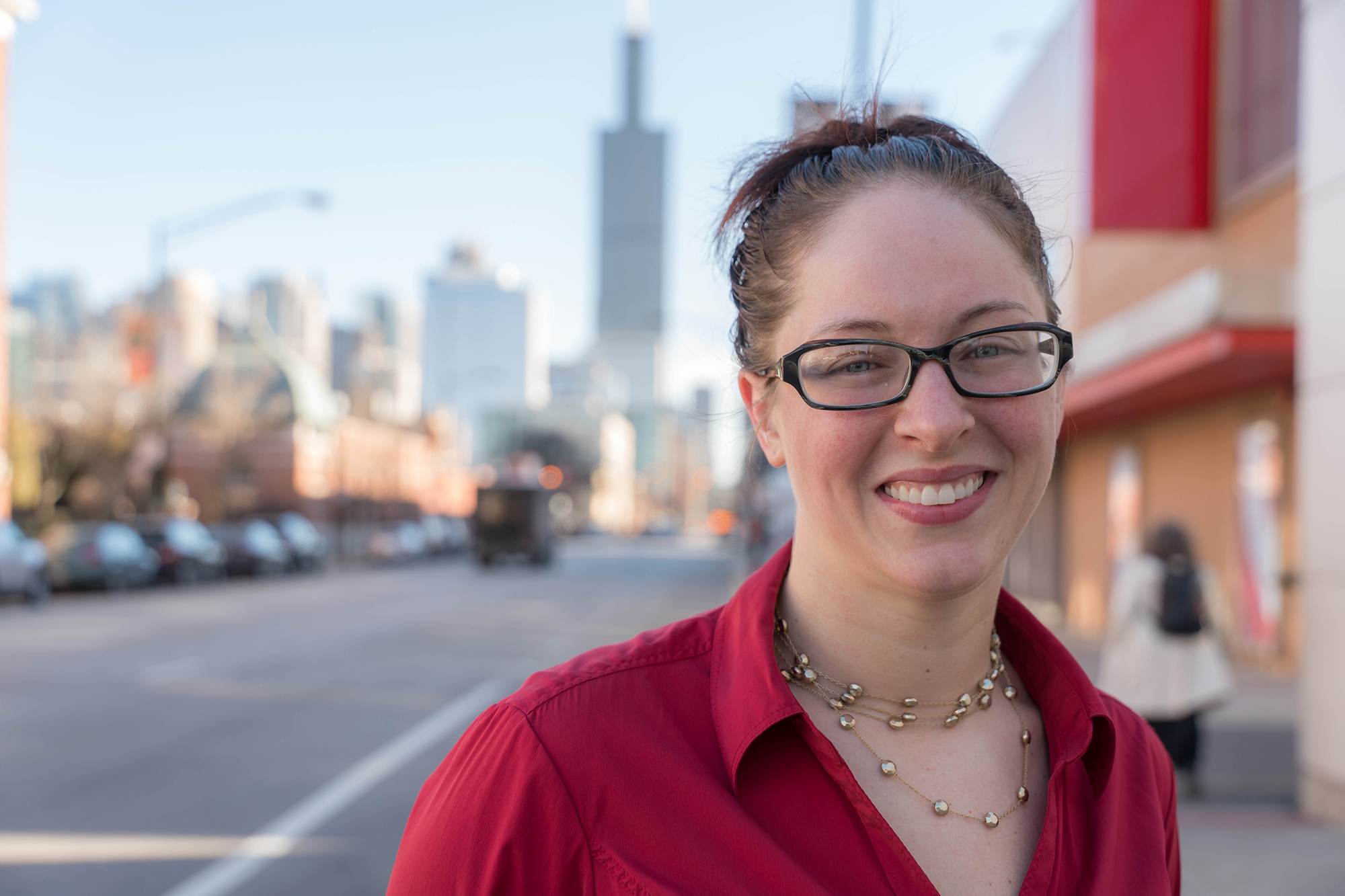 Krista Ellensohn standing outside Hubbard Street Dance Company in Chicago