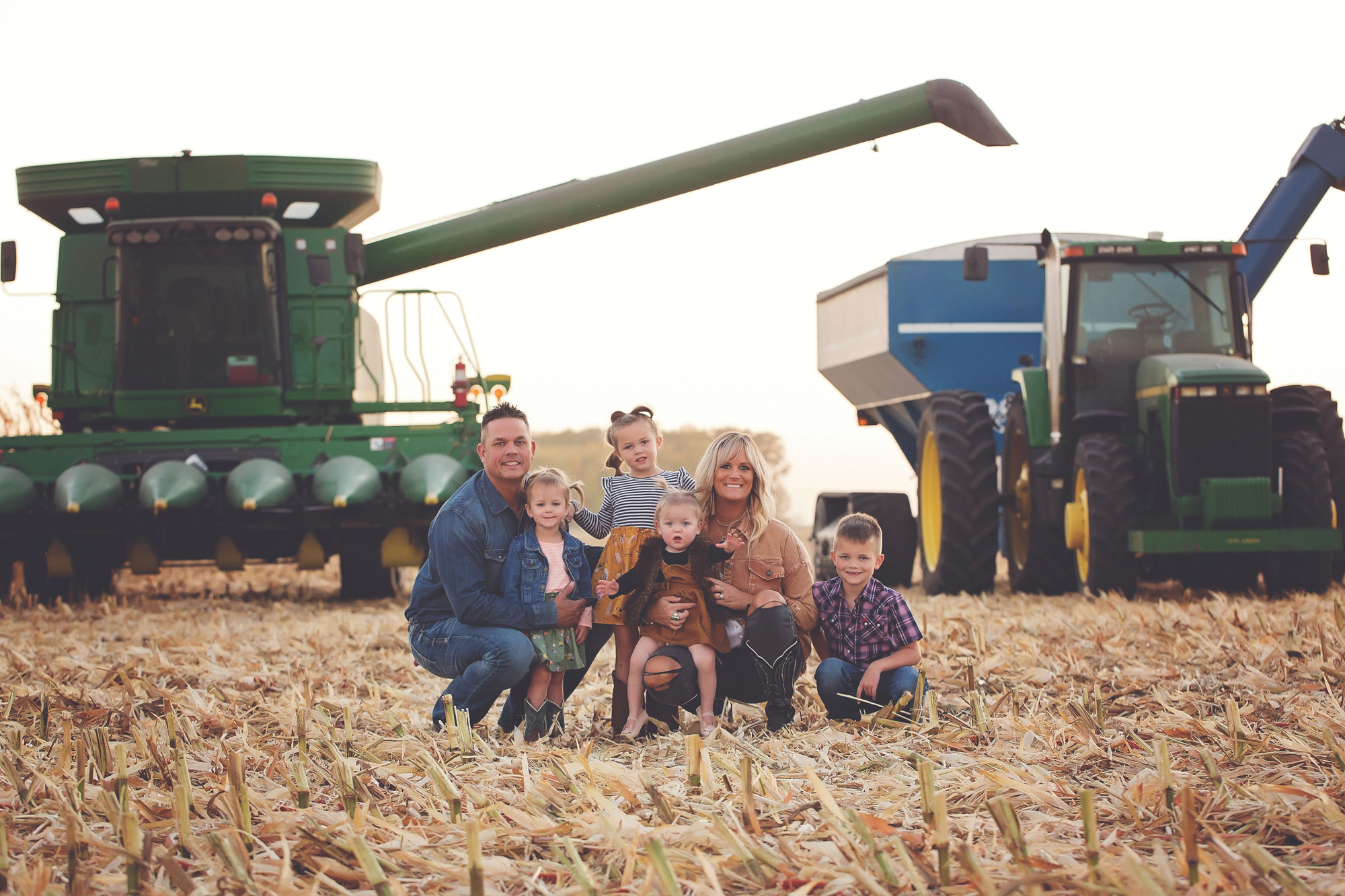 the gardner family of woden, iowa, in the fields on their family farm