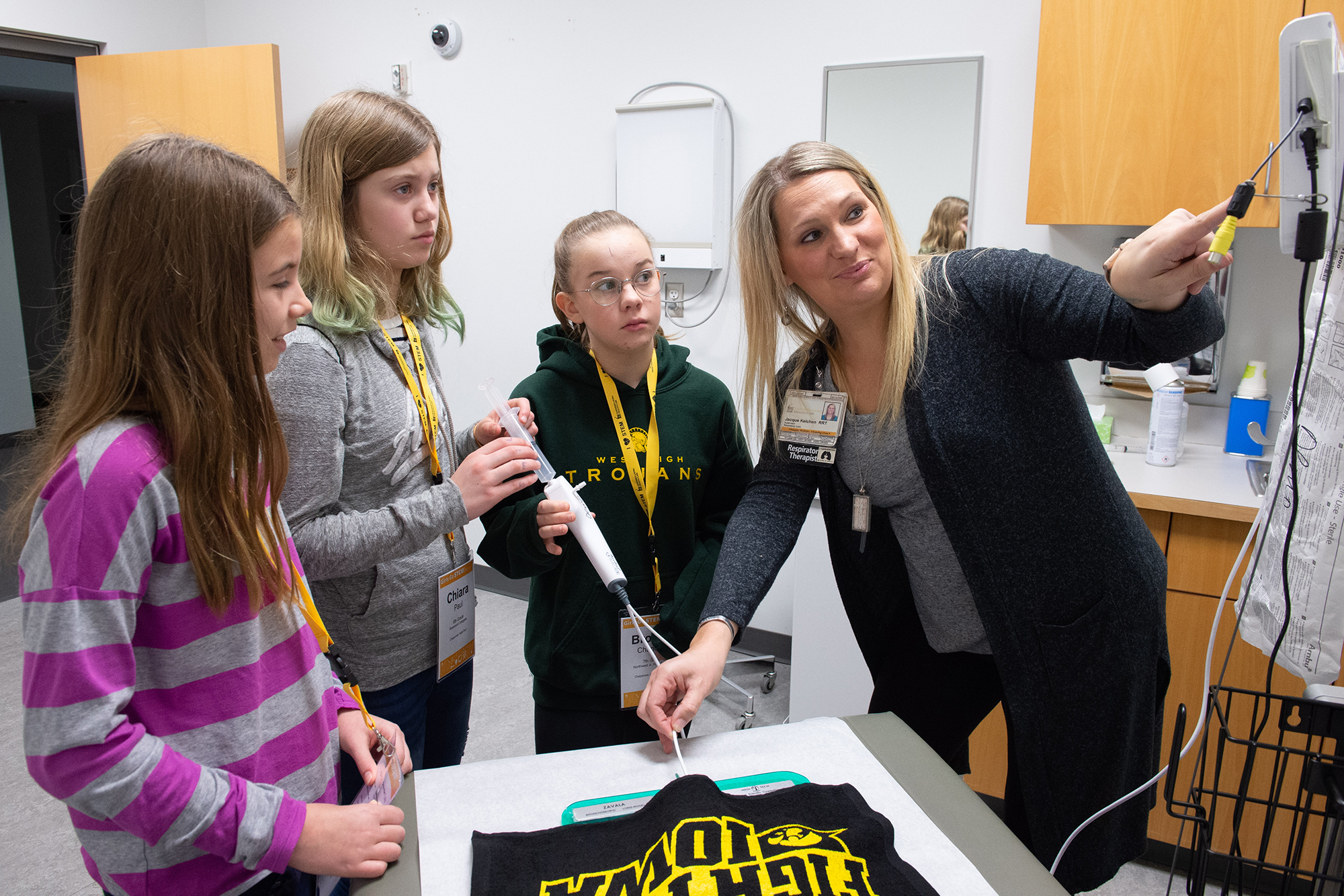 Girls Go STEM participants work with Jacque Kelchen, a respiratory care supervisor at University of Iowa Hospitals and Clinics