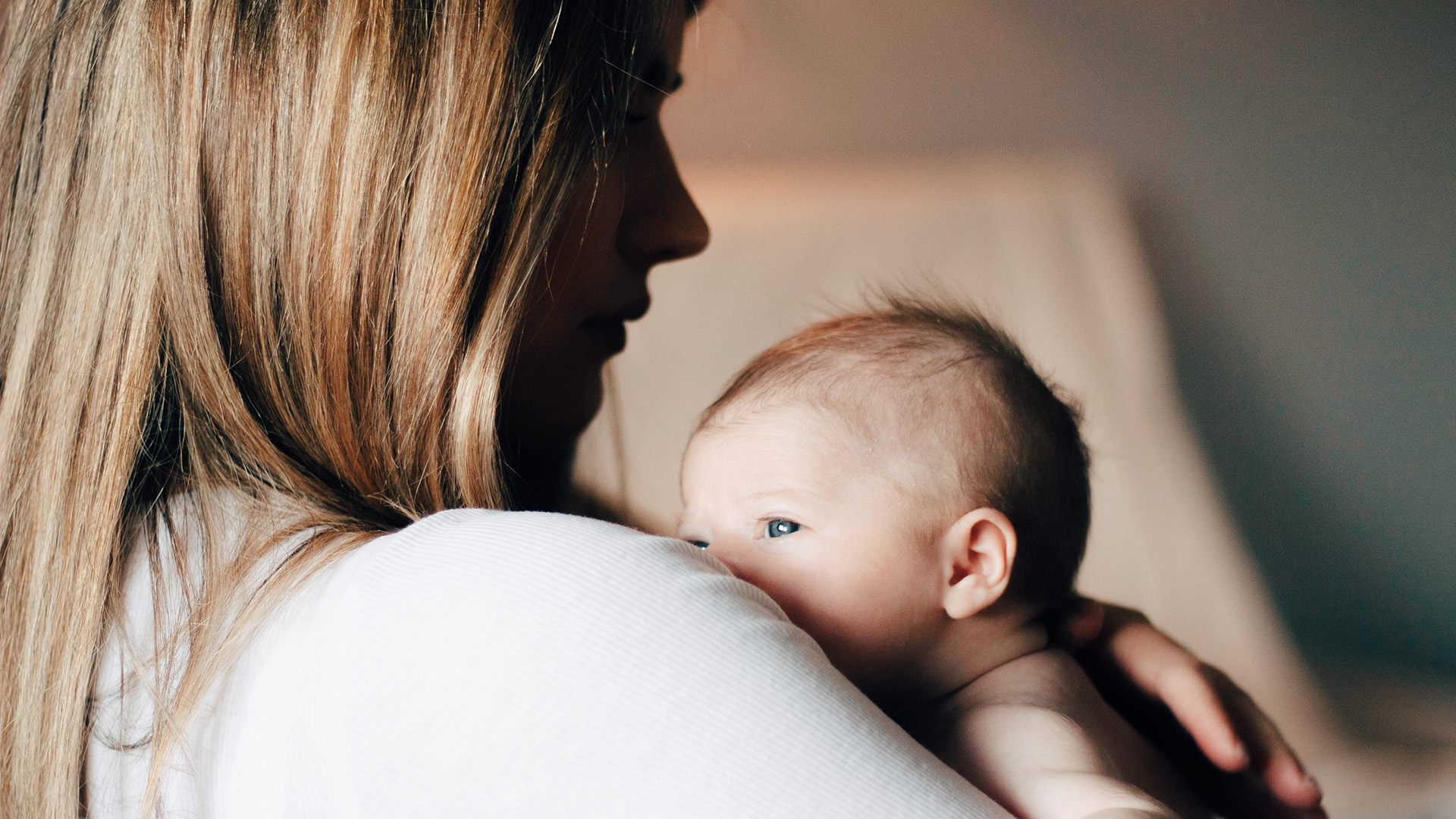 woman holding newborn