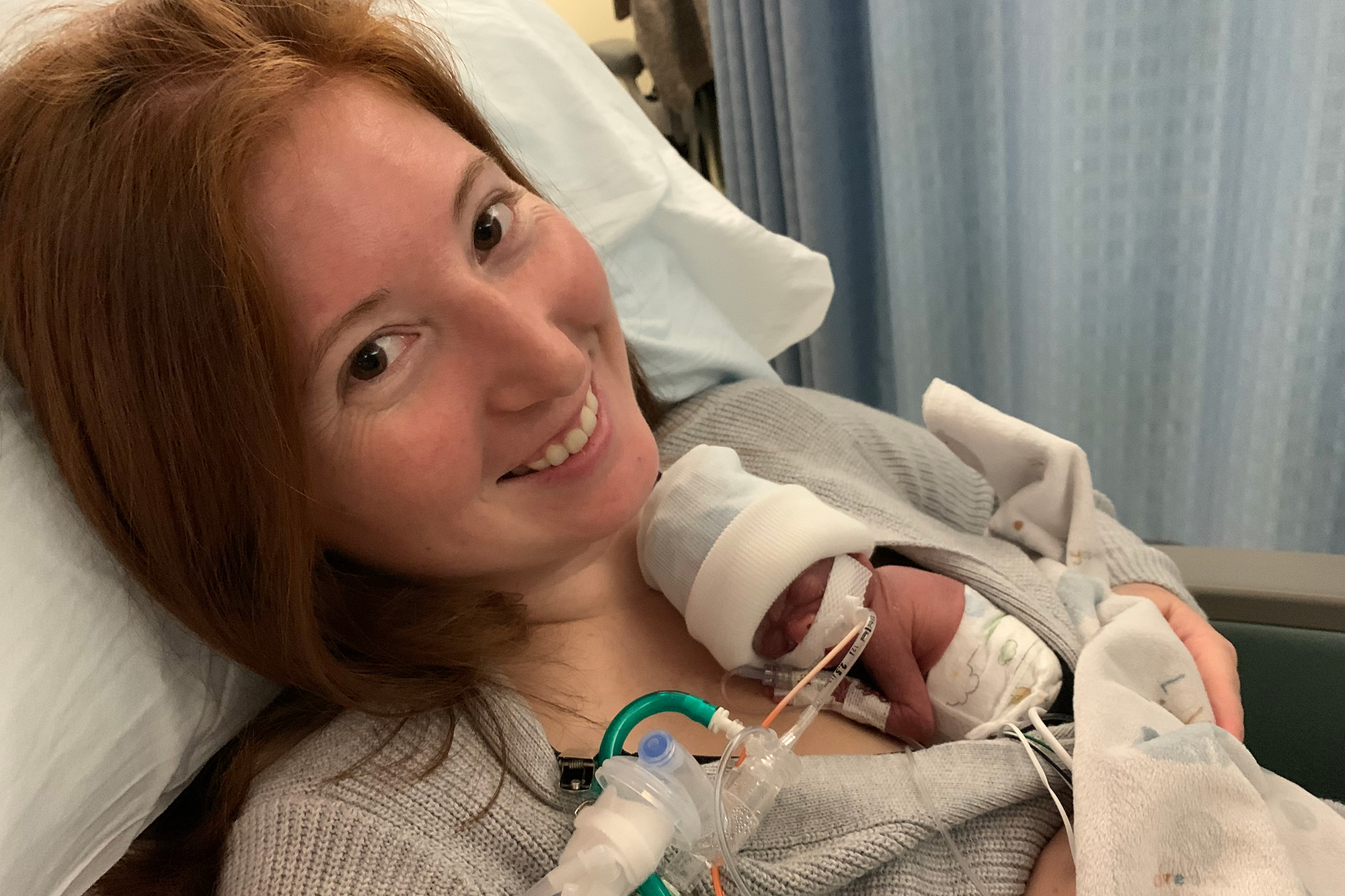 Emily Eilers in the hospital with daughter Evelyn on her chest