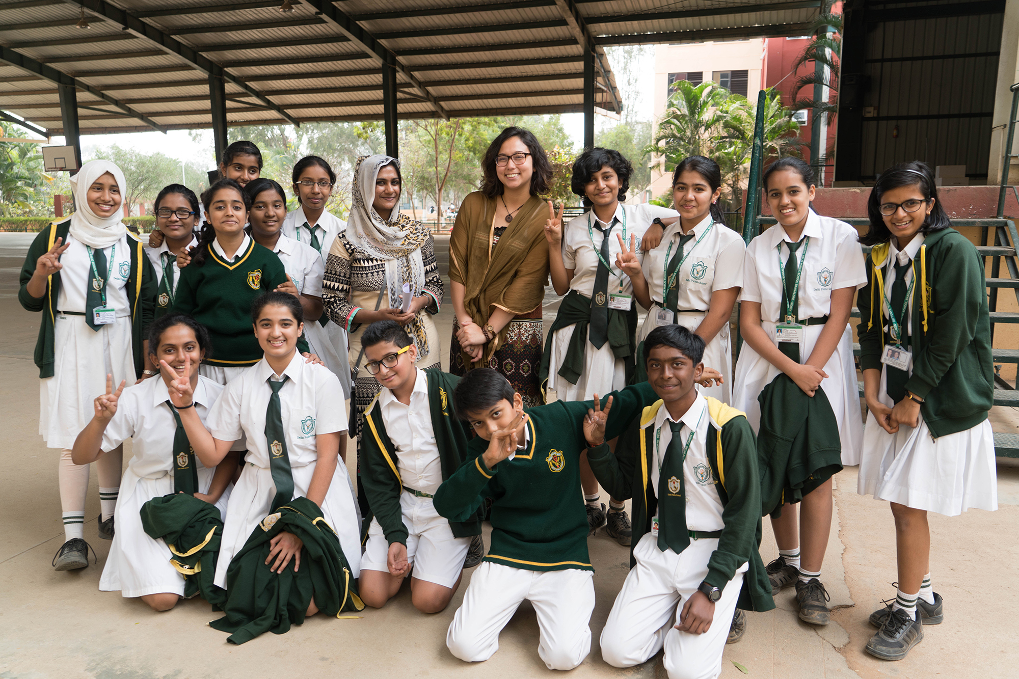 students posing for photo in india
