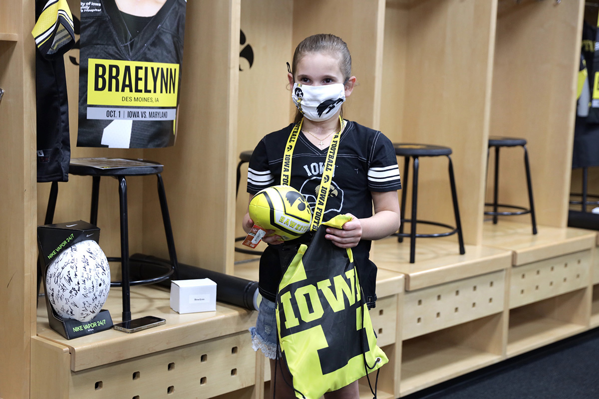 BraeLynn Krisinger in the Iowa Hawkeyes locker room at Kinnick Stadium