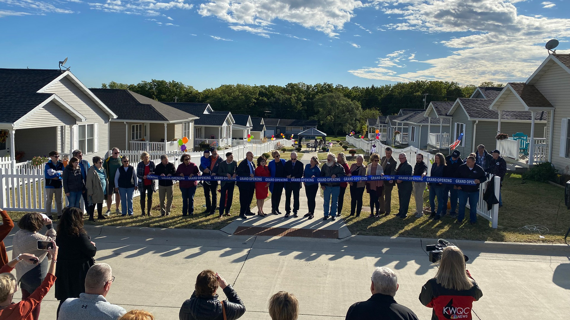 a ribbon cutting in a new neighborhood in Maquoketa, Iowa