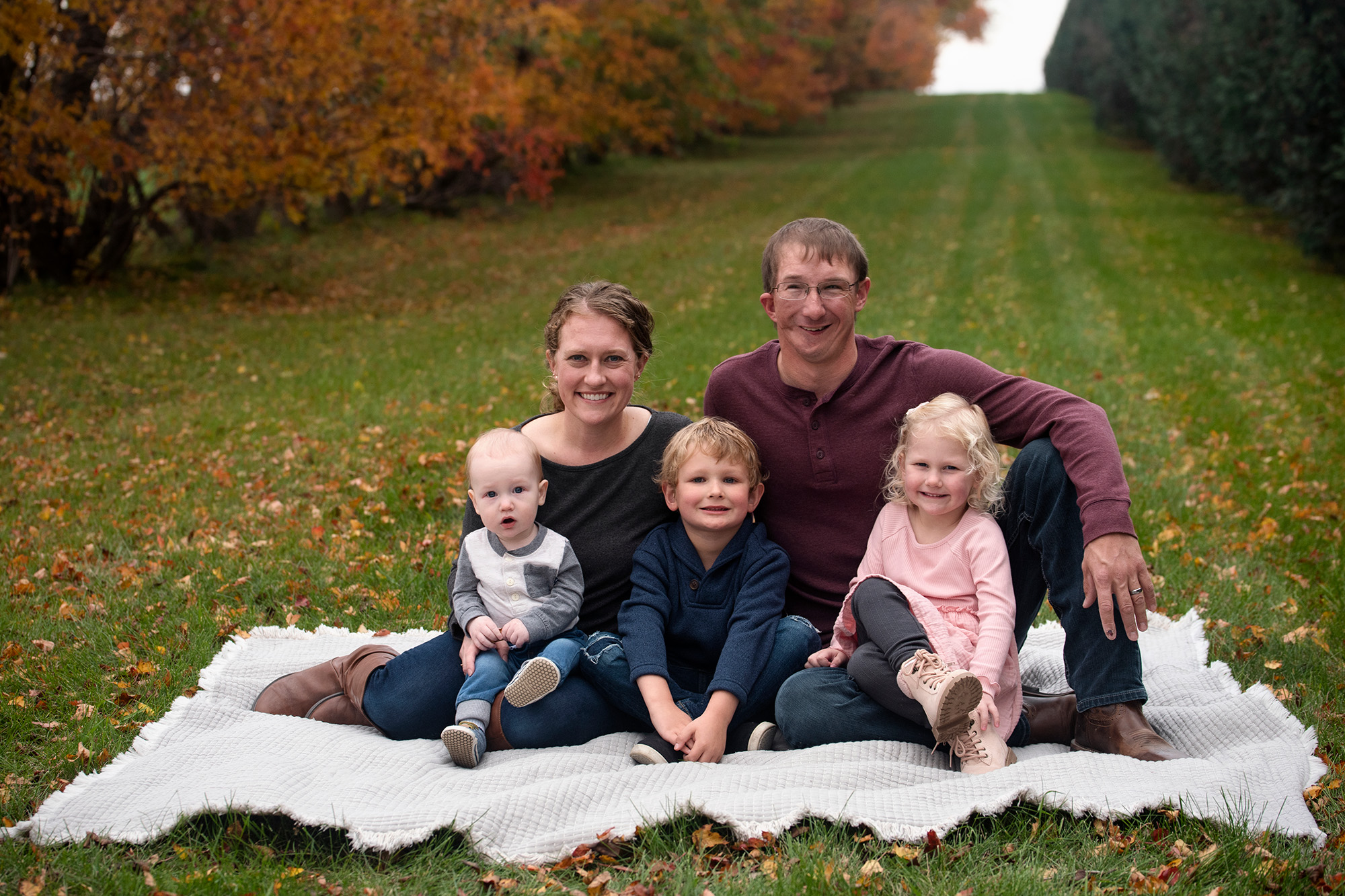 University of Iowa dental grad Amy Seehusen with her husband and their three children