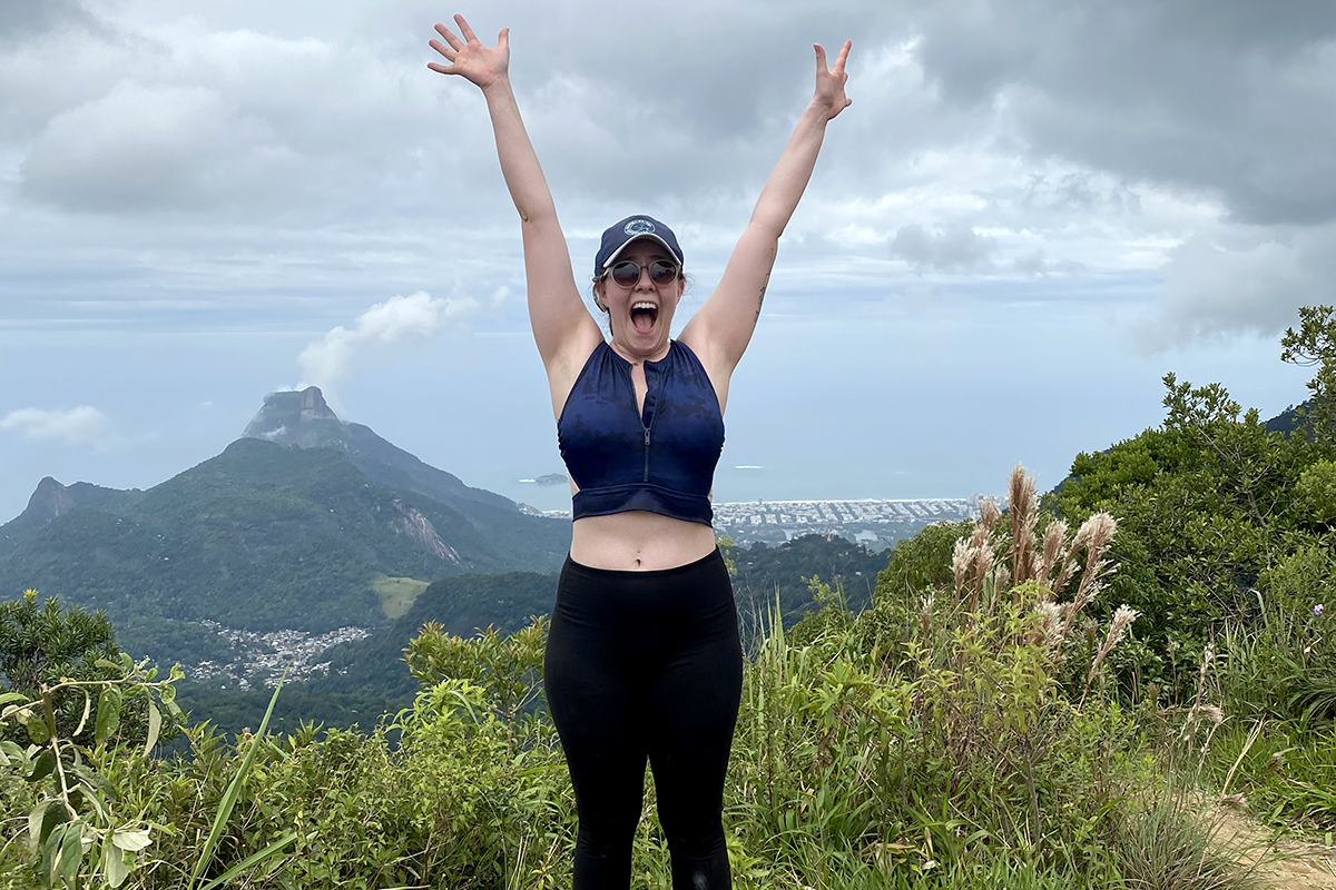 Rebekah Hall raising her arms in Brazil