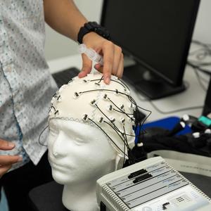 Student with brain model