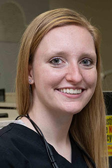 a woman in a dental clinic setting