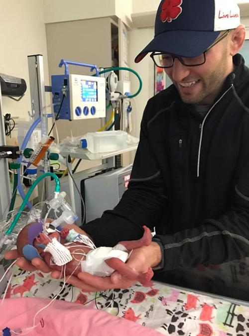 Kerigan Knipp with her father, Jason, in the NICU at University of Iowa Stead Family Children's Hospital