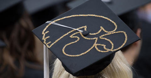 Decorated graduation cap with TigerHawk logo